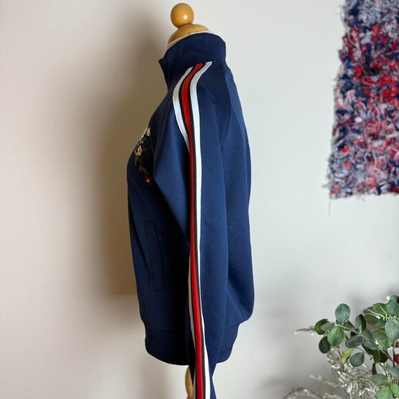 Navy blue floral zip up track jacket with red and white striped sleeves - Picture 2 of 8